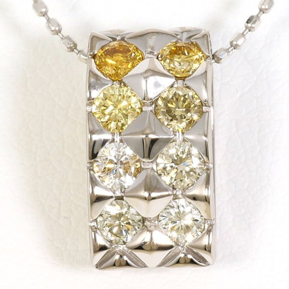 18K (18-karat white gold) necklace with yellow diamonds and other (total 0.53...